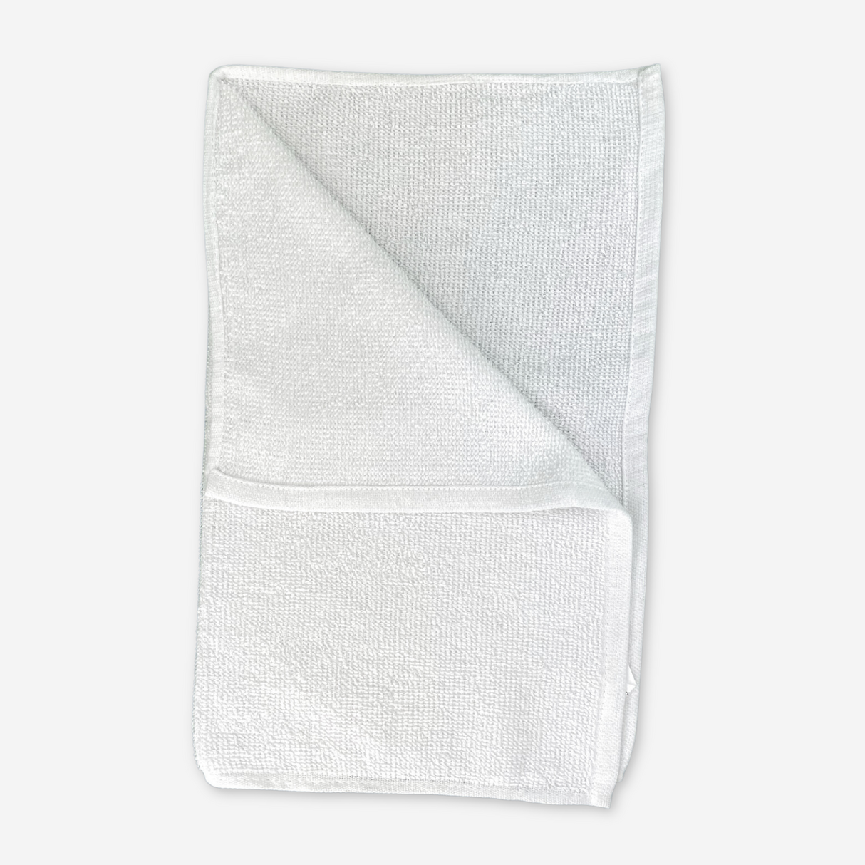 White mop folded on a white background, used for hospitality services.