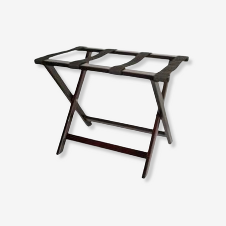 Wooden luggage rack, walnut color, for hotel rooms.