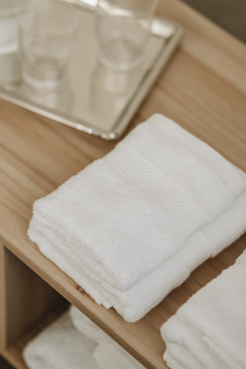 How to Prepare Your Hospitality Textiles for Summer 2026: A Practical Checklist for Hotels, Spas and Resorts